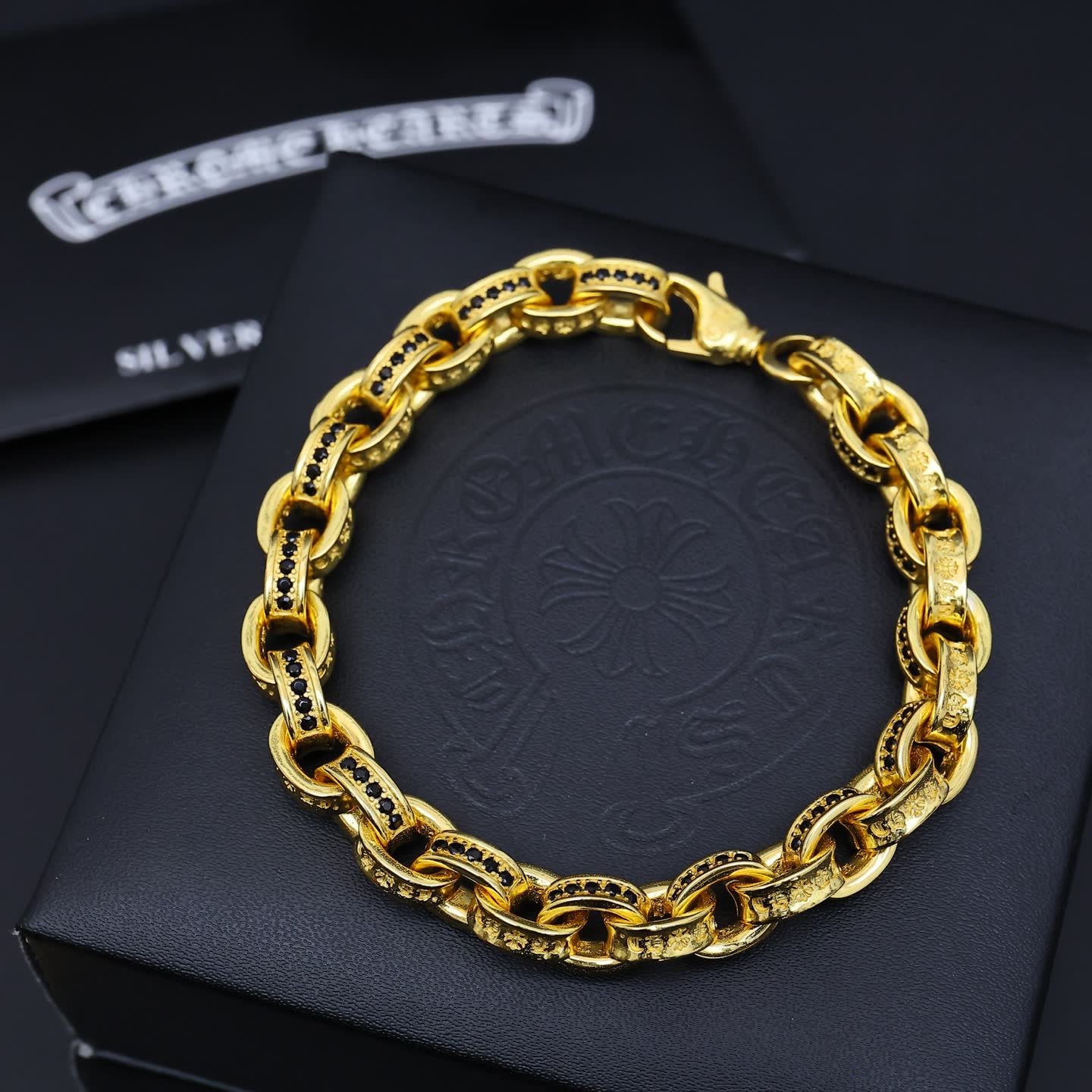 Chrome Hearts Gold Bracelet with Black and Purple Stones